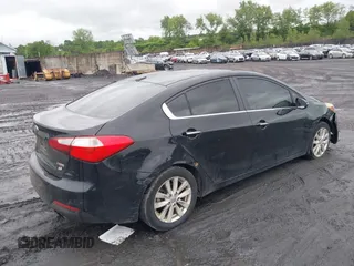 2014 Kia Forte EX z VIN KNAFX4A85E5046464, wystawiony jako IAAI lot #42326739 z przebiegiem 183 658 mil mil oraz . Historia ofert i sprzedaży dostępna na DreamBid. Obrazek 4.