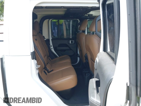 2021 Jeep Gladiator High Altitude with VIN 1C6HJTFG8ML551570, listed as a IAAI auction lot 42229235 with 56,959 mi miles and . Bid and sale history available at DreamBid. Image 8.