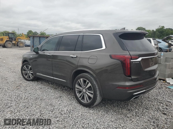 2020 Cadillac XT6 FWD Premium Luxury with VIN 1GYKPCRS4LZ133123, listed as a Copart auction lot 59411115 with 64,463 mi miles and Salvage title. Bid and sale history available at DreamBid. Image 2.