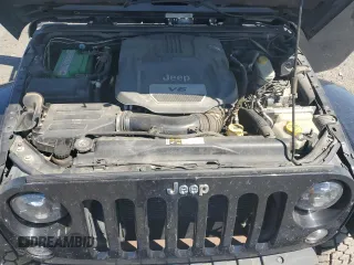 2014 Jeep Wrangler Unlimited Rubicon с VIN 1C4BJWFG7EL119344, выставлен на аукционе Copart как лот 65652265 с пробегом 150 934 миль миль и Списание • Salvage title. История ставок и продаж доступна на DreamBid. Изображение 12.