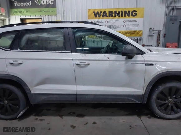 2023 Volkswagen Taos S with VIN 3VVCX7B21PM369216, listed as a IAAI auction lot 41343150 with 22,350 mi miles. Bid and sale history available at carsss.com. Image 13.