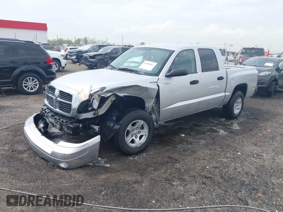 2007 Dodge Dakota SLT with VIN 1D7HE48KX7S122712, listed as a IAAI auction lot 41888864 with 114,384 mi miles and . Bid and sale history available at carsss.com. Image 21.