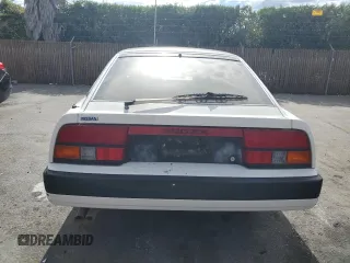 1985 Nissan 300ZX z VIN JN1HZ16S9FX050874, wystawiony jako Copart lot #72283704 z przebiegiem 139 895 mil mil oraz Tytuł czysty. Historia ofert i sprzedaży dostępna na DreamBid. Obrazek 6.