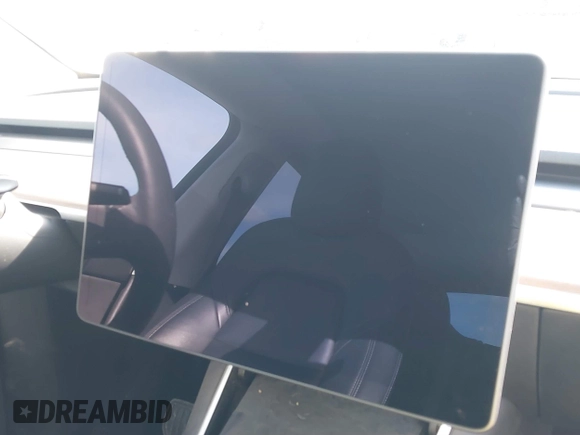 2021 Tesla Model Y Standard Range with VIN 5YJYGDED9MF110697, listed as a IAAI auction lot 41707730 with Not Provided miles and . Bid and sale history available at carsss.com. Image 7.