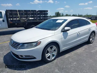 2013 Volkswagen CC Sport with VIN WVWBN7AN7DE559146, listed as a IAAI auction lot 42229896 with 152,058 mi miles and . Bid and sale history available at DreamBid. Image 2.