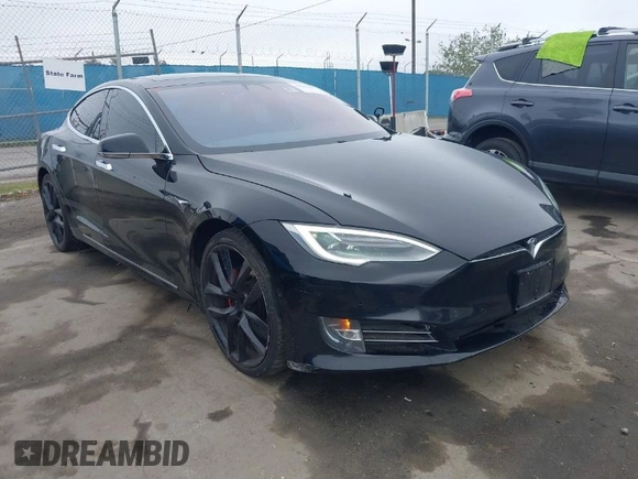 2018 Tesla Model S 75D with VIN 5YJSA1E42JF265691, listed as a IAAI auction lot 41886105 with 99,485 mi miles and . Bid and sale history available at DreamBid. Image 1.