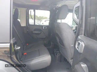 2020 Jeep Wrangler Unlimited Willys with VIN 1C4HJXDN5LW327476, listed as a IAAI auction lot 42128406 with 43,885 mi miles and . Bid and sale history available at DreamBid. Image 8.