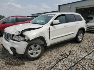 2011 Jeep Grand Cherokee Laredo z VIN 1J4RR4GG7BC571732, wystawiony jako Copart lot #59233815 z przebiegiem 213 829 mil mil oraz Czysty tytuł • Clean title. Historia ofert i sprzedaży dostępna na DreamBid. Obrazek 1.