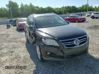 2010 Volkswagen Tiguan Wolfsburg Edition z VIN WVGAV7AX2AW527803, wystawiony jako Copart lot #55920475 z przebiegiem 107 682 mil mil oraz Szkoda całkowita • Salvage title. Historia ofert i sprzedaży dostępna na DreamBid. Obrazek 14.