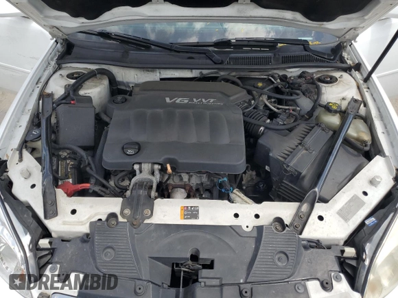 2012 Chevrolet Impala LTZ with VIN 2G1WC5E33C1131846, listed as a Copart auction lot 54431515 with 228,537 mi miles and Salvage Title. Bid and sale history available at DreamBid. Image 11.
