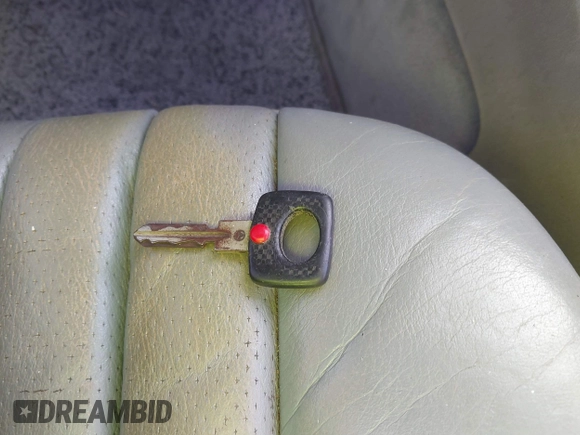 1988 Mercedes-Benz 560 SL with VIN WDBBA48D0JA088479, listed as a IAAI auction lot 41272731 with 91,858 mi miles and . Bid and sale history available at DreamBid. Image 11.