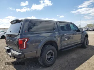 2020 Ford F-150 Raptor with VIN 1FTFW1RG3LFC73188, listed as a Copart auction lot 52573455 with 99,198 mi miles and Salvage Title. Bid and sale history available at carsss.com. Image 3.