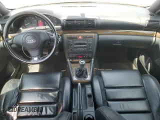2000 Audi S4 z VIN WAUDD68D6YA126804, wystawiony jako Copart lot #61161455 z przebiegiem 148 158 mil mil oraz Czysty tytuł • Clean title. Historia ofert i sprzedaży dostępna na DreamBid. Obrazek 8.