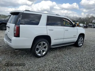 2019 GMC Yukon Denali with VIN 1GKS1CKJ6KR268230, listed as a Copart auction lot 47489035 with 49,549 mi miles and Salvage Title. Bid and sale history available at carsss.com. Image 3.