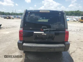 2008 Jeep Commander Sport z VIN 1J8HH48K58C126172, wystawiony jako Copart lot #61961285 z przebiegiem 235 022 mil mil oraz Szkoda całkowita • Salvage title. Historia ofert i sprzedaży dostępna na DreamBid. Obrazek 6.