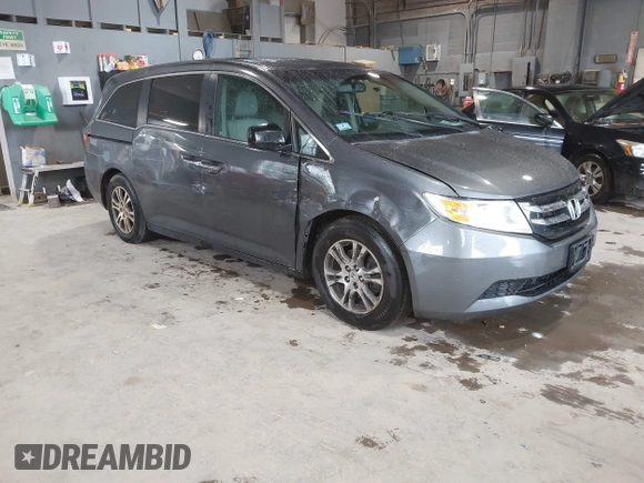 2012 Honda Odyssey EX-L with VIN 5FNRL5H63CB137198, listed as a IAAI auction lot 42706690 with 305,753 mi miles and . Bid and sale history available at DreamBid. Image 1.