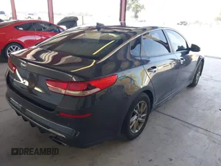 2019 Kia Optima LX with VIN 5XXGT4L31KG324949, listed as a IAAI auction lot 42468112 with 153,404 mi miles and . Bid and sale history available at DreamBid. Image 4.