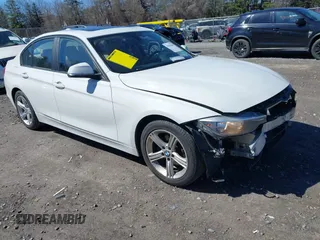 2014 BMW 3 Series 320i xDrive with VIN WBA3C3G58ENS67059, listed as a IAAI auction lot 41854869 with 152,111 mi miles. Bid and sale history available at carsss.com. Image 1.