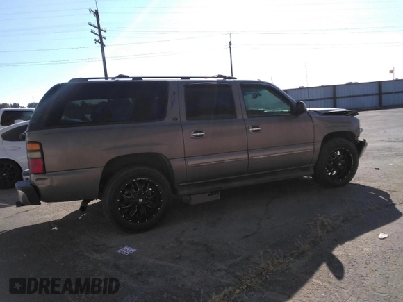 2004 Chevrolet Suburban LT with VIN 1GNFK16Z14J123135, listed as a Copart auction lot 70908164 with 253,555 mi miles and Salvage Title. Bid and sale history available at carsss.com. Image 3.