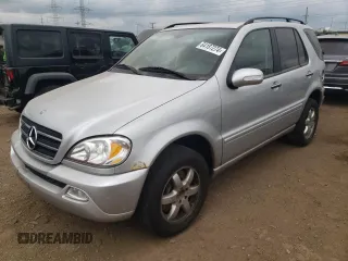2004 Mercedes-Benz M-Class 5.0L with VIN 4JGAB75E84A465553, listed as a Copart auction lot 64187274 with 96,844 mi miles and Salvage Title. Bid and sale history available at carsss.com. Image 1.