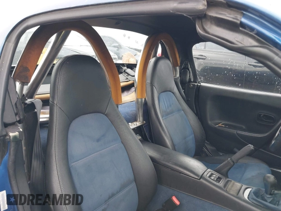 1999 Mazda MX-5 Miata with VIN JM1NB3539X0130910, listed as a IAAI auction lot 42175118 with 91,570 mi miles and . Bid and sale history available at DreamBid. Image 8.