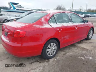 2013 Volkswagen Jetta Sedan S with VIN 3VW2K7AJ9DM382421, listed as a IAAI auction lot 41738229 with 213,908 mi miles. Bid and sale history available at carsss.com. Image 4.