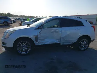 2015 Cadillac SRX Premium Collection with VIN 3GYFNDE32FS530357, listed as a IAAI auction lot 41976585 with 92,335 mi miles and . Bid and sale history available at carsss.com. Image 6.
