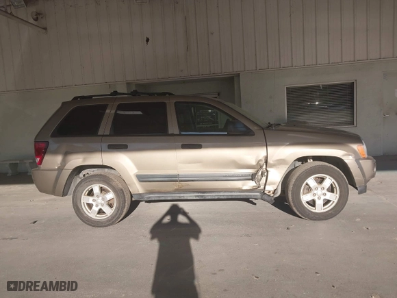 2005 Jeep Grand Cherokee Laredo with VIN 1J8HR48N95C713185, listed as a IAAI auction lot 41777242 with 95,262 mi miles. Bid and sale history available at carsss.com. Image 13.