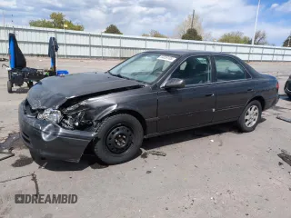 2000 Toyota Camry CE with VIN JT2BG22K2Y0480626, listed as a Copart auction lot 54059185 with 273,794 mi miles and Salvage Title. Bid and sale history available at DreamBid. Image 1.