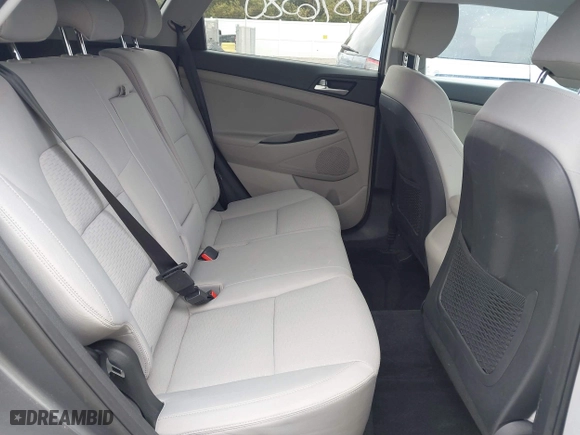2019 Hyundai Tucson Value with VIN KM8J33A40KU999340, listed as a IAAI auction lot 41876380 with 52,752 mi miles. Bid and sale history available at carsss.com. Image 8.