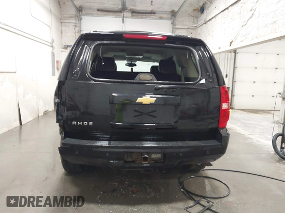 2013 Chevrolet Tahoe LT with VIN 1GNSKBE07DR305706, listed as a IAAI auction lot 42004594 with 166,020 mi miles and . Bid and sale history available at DreamBid. Image 16.