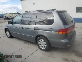 2002 Honda Odyssey EX z VIN 5FNRL18652B014929, wystawiony jako Copart lot #57185775 z przebiegiem 291 807 mil mil oraz Czysty tytuł • Clean title. Historia ofert i sprzedaży dostępna na DreamBid. Obrazek 2.