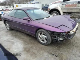 1995 Ford Probe z VIN 1ZVLT22B9S5142588, wystawiony jako Copart lot #89005925 z przebiegiem 83 937 mil mil oraz Szkody całkowita. Historia ofert i sprzedaży dostępna na DreamBid. Obrazek 4.