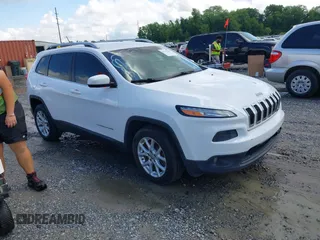 2018 Jeep Cherokee Latitude with VIN 1C4PJLCB1JD553390, listed as a IAAI auction lot 42233220 with 130,418 mi miles and . Bid and sale history available at DreamBid. Image 1.