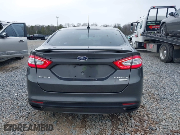 2016 Ford Fusion Titanium with VIN 3FA6P0K94GR183257, listed as a IAAI auction lot 41374728 with 67,780 mi miles and . Bid and sale history available at carsss.com. Image 16.