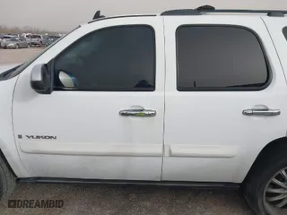 2009 GMC Yukon SLT w/4SB with VIN 1GKFC33009R149228, listed as a IAAI auction lot 41709590 with 212,227 mi miles. Bid and sale history available at carsss.com. Image 14.