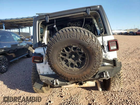 2021 Jeep Wrangler Unlimited Sport Altitude with VIN 1C4HJXDN1MW597113, listed as a Copart auction lot 80121424 with 50,409 mi miles and Salvage title. Bid and sale history available at DreamBid. Image 6.