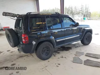 2007 Jeep Liberty Limited with VIN 1J8GL58K07W658037, listed as a IAAI auction lot 41993738 with 203,771 mi miles. Bid and sale history available at carsss.com. Image 4.