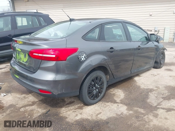 2018 Ford Focus S with VIN 1FADP3E29JL227881, listed as a IAAI auction lot 41968214 with 150,713 mi miles. Bid and sale history available at carsss.com. Image 4.