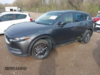 2020 Mazda CX-5 Touring with VIN JM3KFBCM8L0863951, listed as a IAAI auction lot 41921635 with 88,629 mi miles. Bid and sale history available at carsss.com. Image 19.