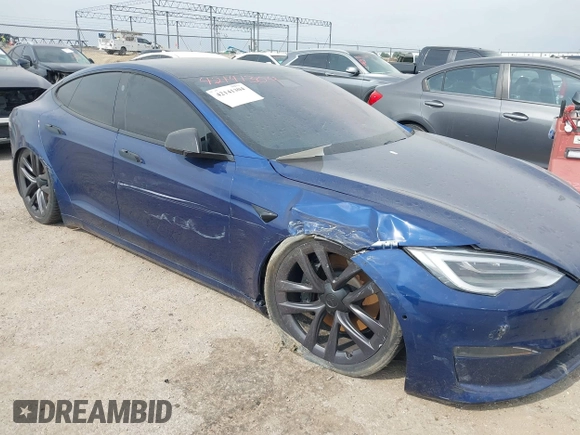 2021 Tesla Model S Plaid with VIN 5YJSA1E64MF442036, listed as a IAAI auction lot 42141304 with 24,998 mi miles and . Bid and sale history available at DreamBid. Image 6.