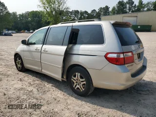 2006 Honda Odyssey EX-L with VIN 5FNRL38706B037805, listed as a Copart auction lot 57390365 with 219,554 mi miles and Salvage title. Bid and sale history available at DreamBid. Image 2.