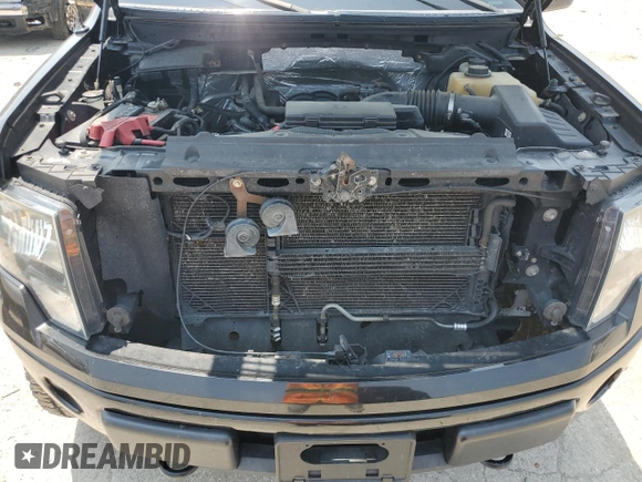 2012 Ford F-150 XL with VIN 1FTFW1EF7CFB59949, listed as a Copart auction lot 59999555 with 123,074 mi miles and Salvage title. Bid and sale history available at DreamBid. Image 11.