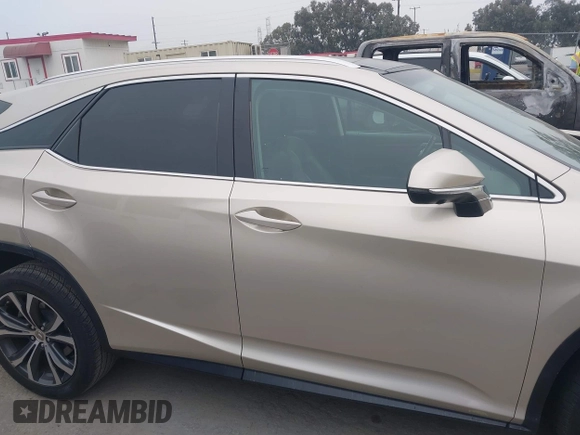 2016 Lexus RX 350 z VIN 2T2ZZMCA7GC026468, wystawiony jako IAAI lot #42433640 z przebiegiem 91 376 mil mil oraz . Historia ofert i sprzedaży dostępna na DreamBid. Obrazek 14.