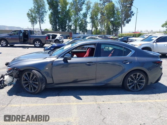 2023 Lexus IS 350 F Sport z VIN JTHGZ1B27P5063424, wystawiony jako IAAI lot #42233332 z przebiegiem 61 589 mil mil oraz . Historia ofert i sprzedaży dostępna na DreamBid. Obrazek 13.