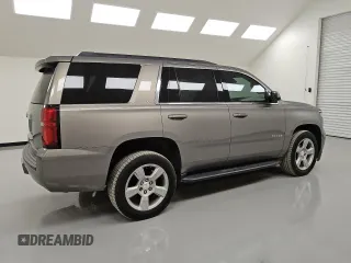 2019 Chevrolet Tahoe LT with VIN 1GNSCBKC0KR100687, listed as a Copart auction lot 53123455 with 104,006 mi miles and Clean title. Bid and sale history available at DreamBid. Image 3.