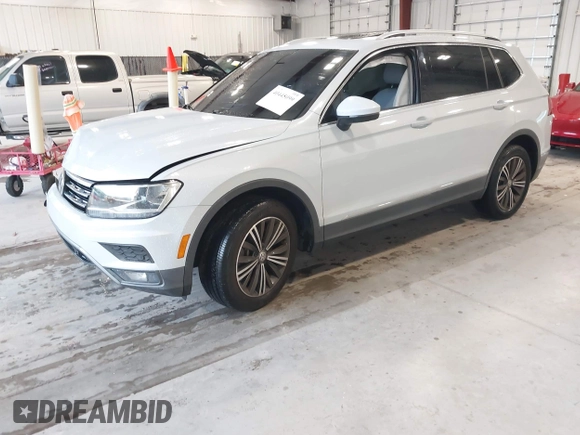 2019 Volkswagen Tiguan SE with VIN 3VV3B7AX9KM030028, listed as a IAAI auction lot 40445099 with 85,400 mi miles and . Bid and sale history available at DreamBid. Image 19.