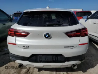 2021 BMW X2 sDrive28i with VIN WBXYH9C08M5S77485, listed as a Copart auction lot 76514664 with 0 mi miles and Non Repairable. Bid and sale history available at carsss.com. Image 6.
