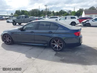 2013 BMW M5 with VIN WBSFV9C59DD096774, listed as a IAAI auction lot 41608286 with 82,601 mi miles. Bid and sale history available at carsss.com. Image 14.