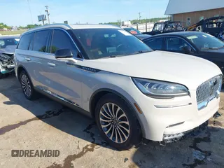 2021 Lincoln Aviator Reserve z VIN 5LM5J7WC6MGL12195, wystawiony jako IAAI lot #42159567 z przebiegiem 95 199 mil mil oraz . Historia ofert i sprzedaży dostępna na DreamBid. Obrazek 1.